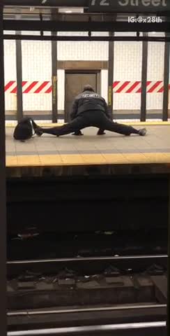 Security jackets does splits in subway terminal