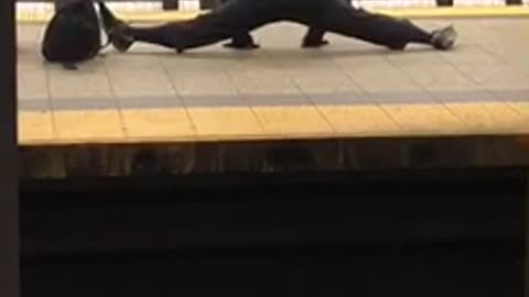 Security jackets does splits in subway terminal