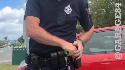 Perturbed Police Man Doesn't Like Driver's Phone