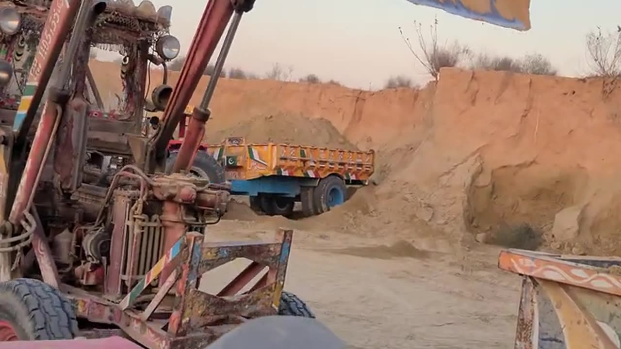 Belarus 510 converter into Loader showell loading sand into a 13 foot jack trolley | pakistan