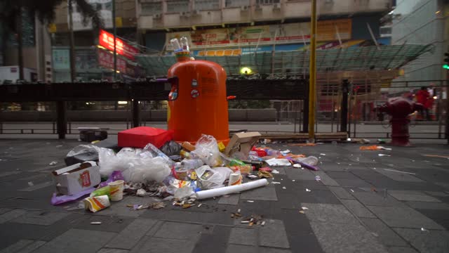 Overflowing Rubbish Bin on Hong Kong Street