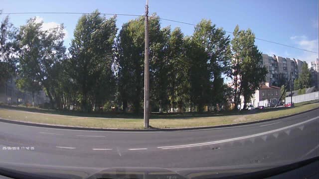 Wind Pushes Sign over onto Woman