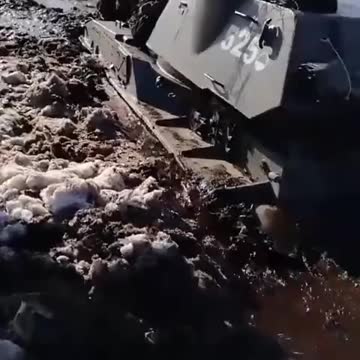 Russian 2S3 Akatsiya 152 mm self-propelled gun stuck in the sludge