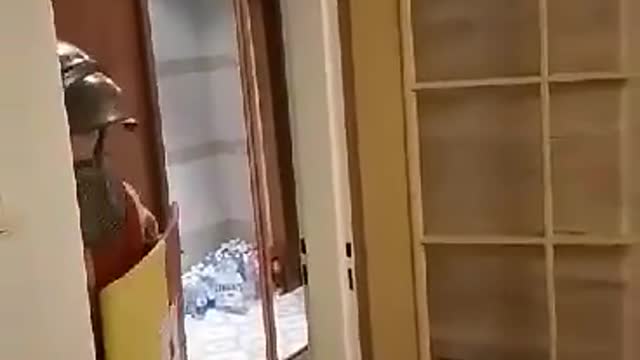 Guy in knight outfit walks into room to eye of the tiger