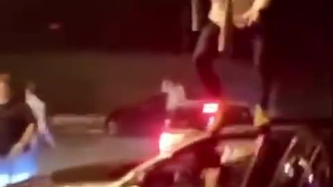 Crazy guy Jumps Off Car