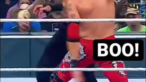 Roman Reigns and Edge exchange fists