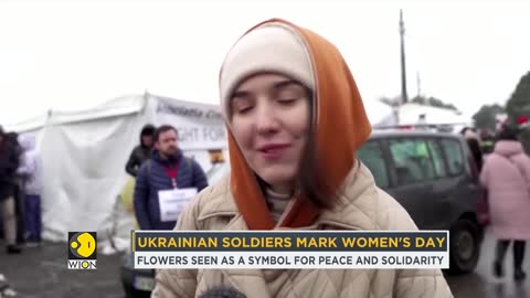 Ukrainian soldiers buy flowers on Women's day _ International Women's Day Specia