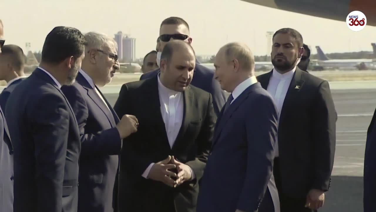 Putin can_t walk_ Watch him hobble along red carpet arriving in Iran