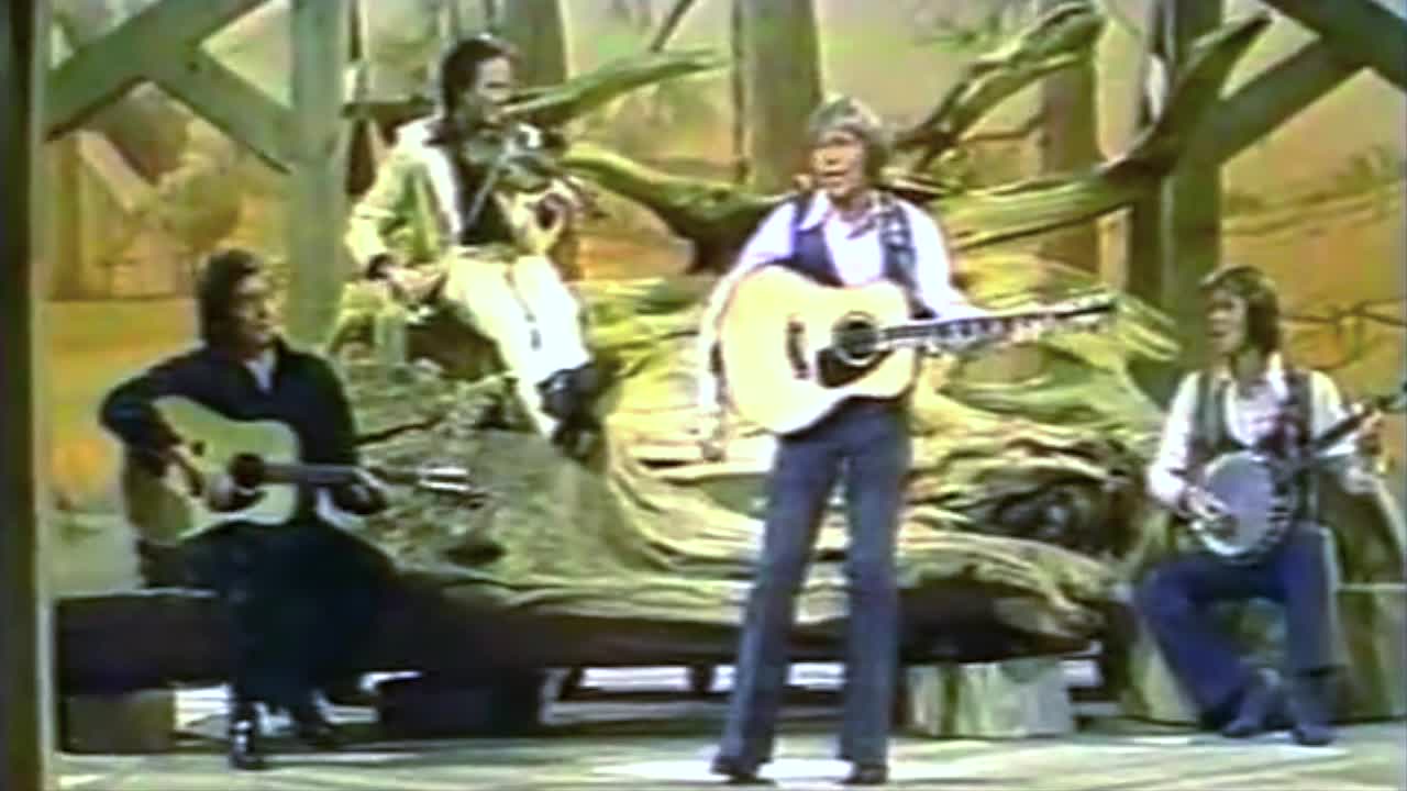 "Thank God I'm A Country Boy" - John Denver (featuring Roger Miller, Glenn Campbell, & Johnny Cash)