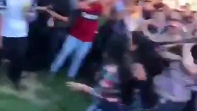 Dancing Man Breaks Up Mass Fight