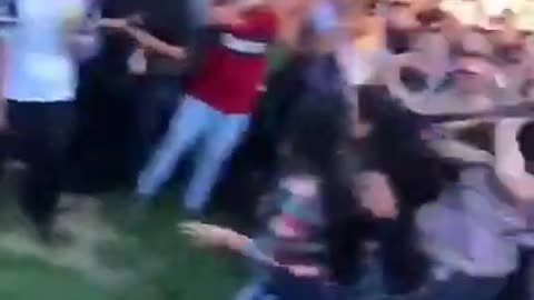 Dancing Man Breaks Up Mass Fight