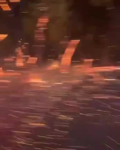 TEXAS - in the background - the tops of the trees are untouched and straight lines of fire