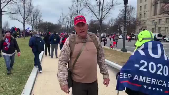 Ray Epps caroling (inciting) the mass of people