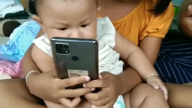 This baby's sister is making a splash, try watching the video