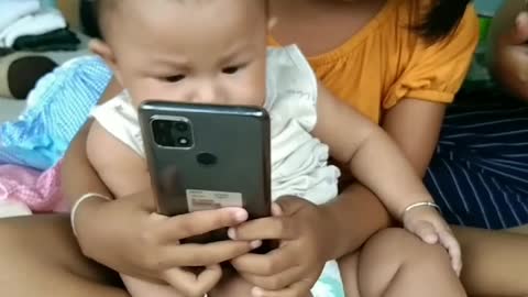 This baby's sister is making a splash, try watching the video