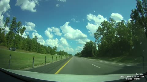 Impatient Driver Tries To Weave Between Cars