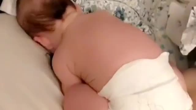 Baby gets adorably startled when mom suddenly starts speaking