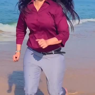 Beautiful hot babe on the beach