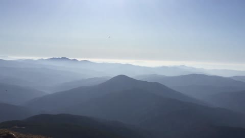 Mountain view covered in fog