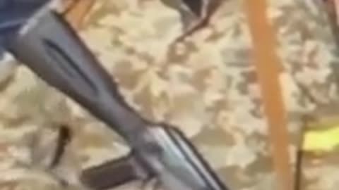 THAT TIME A UKRAINIAN SOLDIER’S FAKE WOODEN GUN CLIP FALLS OUT ON LIVE TV