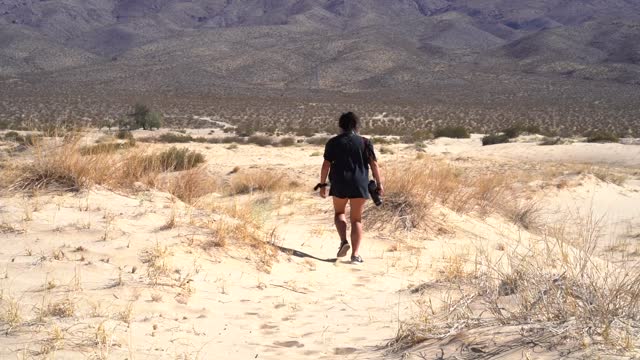 a woman in the desert and nature experience falls garden guide journey lyric spark