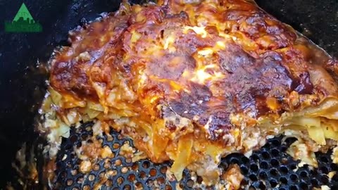 Dutch oven cooking lasagna The best lasagna ever!!!