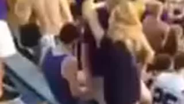 Passionate Kiss Leads To Couple Falling Down Bleachers At Football Game | Funny Videos