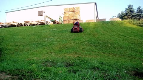 Mowing a steep bank on a zero turn