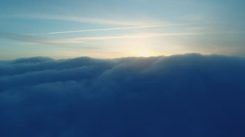 Spectacular sunrise view over the clouds