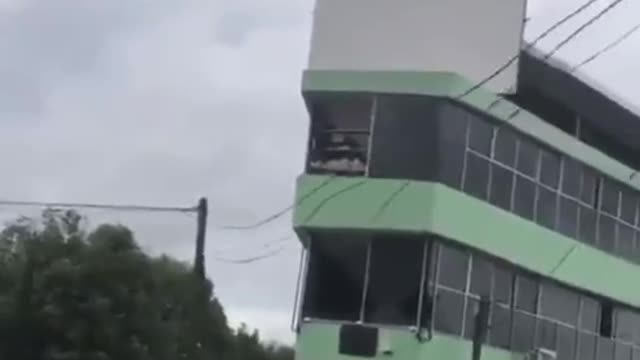 Glass Falls Out Shaking Building During 7.6 Earthquake In Mexico