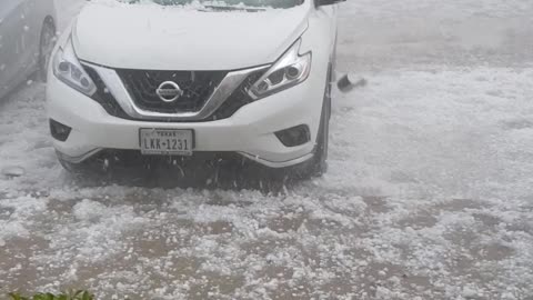Hail Storm Beats and Batters a Car