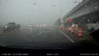 Sign Slams Car in High Winds