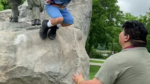 Daddy catches son Mid air