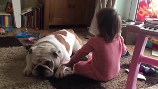 Ava relaxing with her fur brother. Giving him some love by stroking him xx