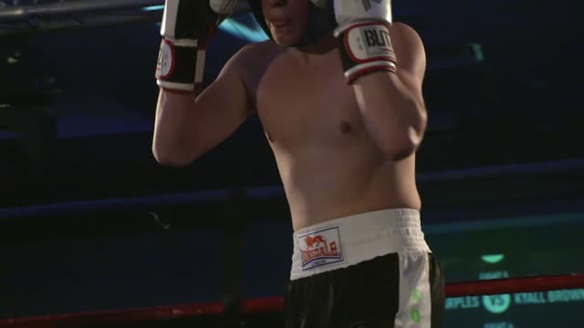 2 boxers sparring in slow motion.
