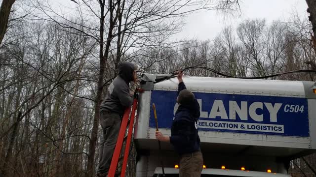 Oops, truck rips down cable wire and wrecks his box