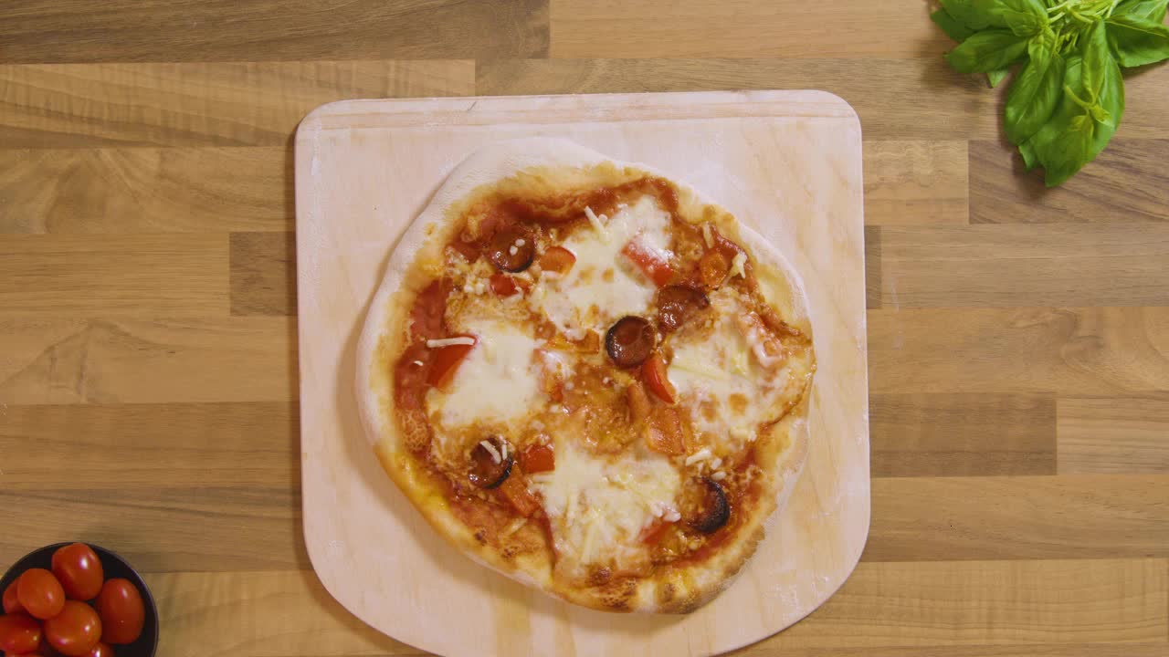 Top View Cooked Pizza on Peel Placed on Worktop