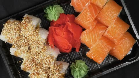 Decorated sushi on a plastic tray