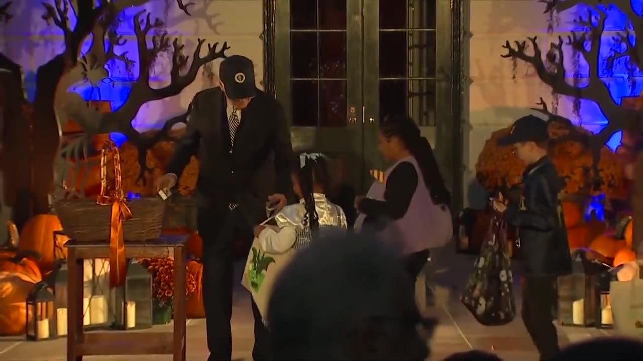 COUGHING CANDYMAN: Biden Coughs Into Hands While Handing Out Candy to Kids [WATCH]