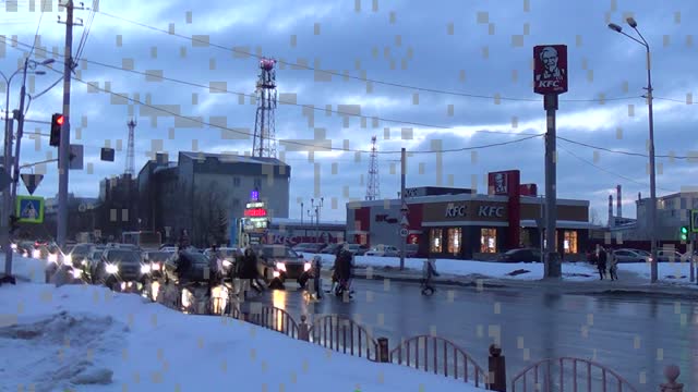 Busy Pedestrian Crossing In The Evening