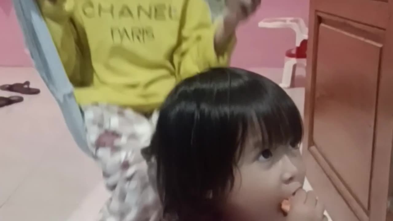 cute child is eating and praying