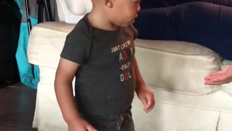 Adorable baby loves dancing