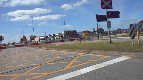 choo choo,vintage shunter crosses kewdale rd rail crossing