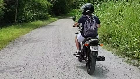 On a motorcycle on the way to the waterfall