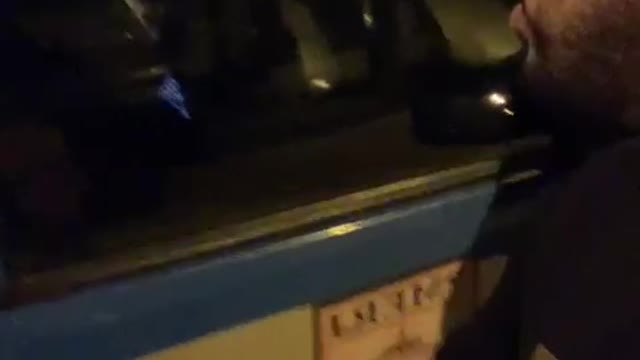 drunk Brazilian breaks police car in Rio de Janeiro
