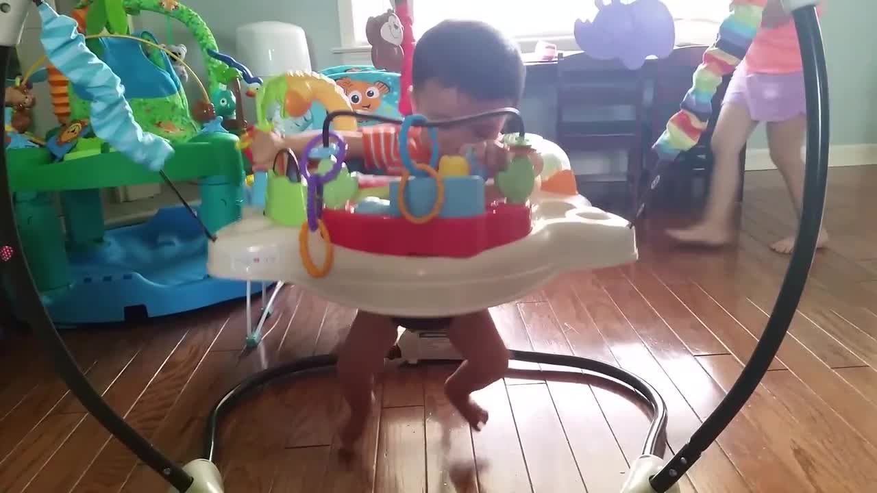 Multitasking Baby Bounces Himself To Sleep