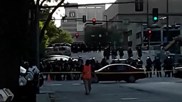 george floyd. protest surrounded by cops.