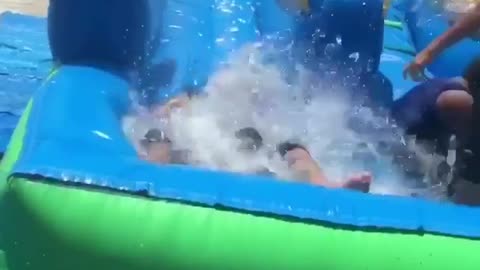 Collab copyright protection - man on water slide crushes small boy