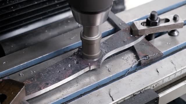 Use A Machine To Drill A Hole In The Dagger