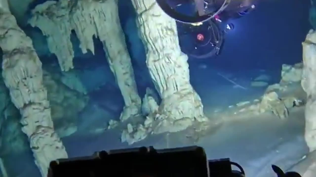 Cave diving with underwater scooters